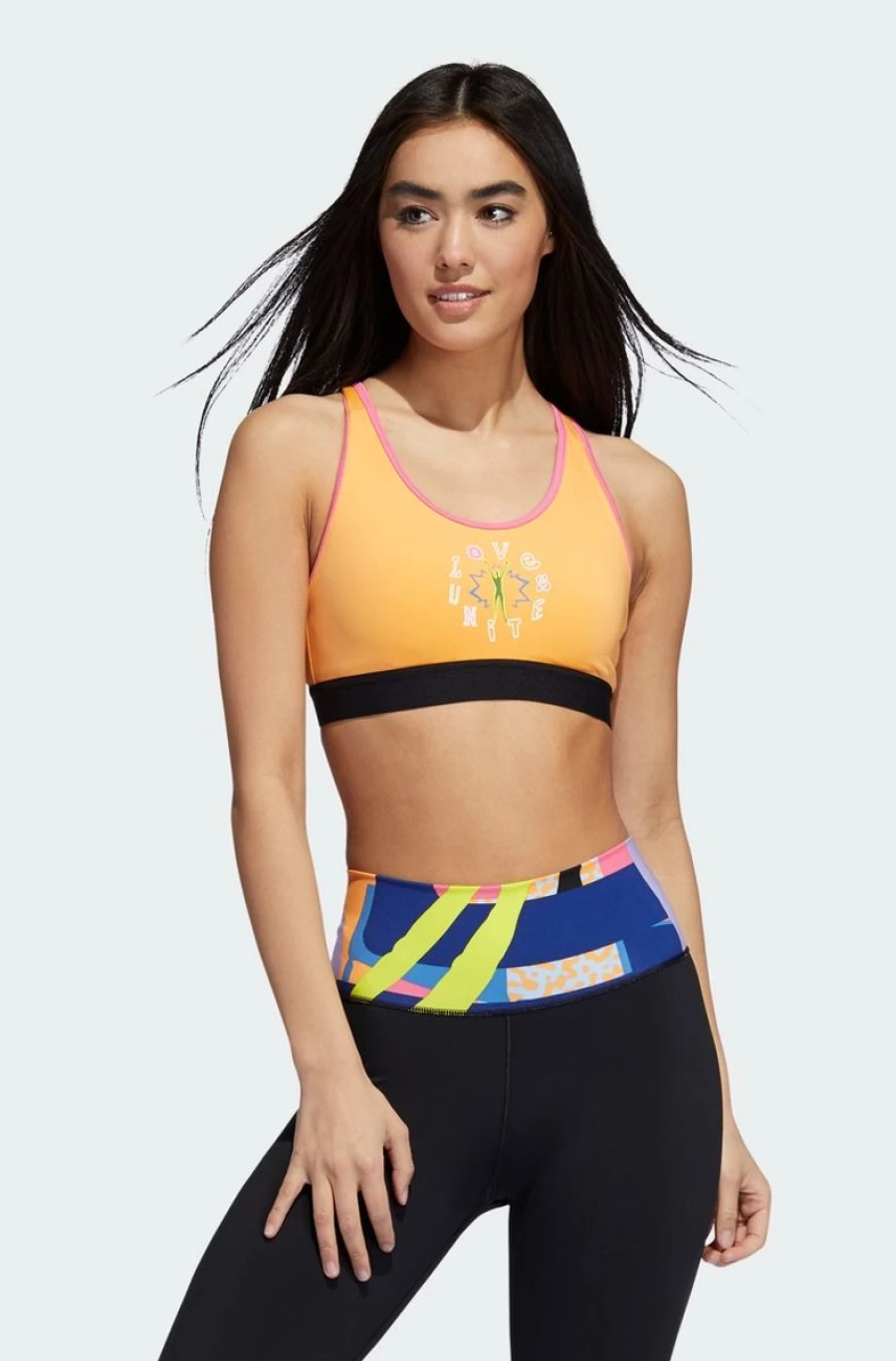 Adidas Women's Love Unites Believe This 2.0 Graphic Bra in Hazy Orange