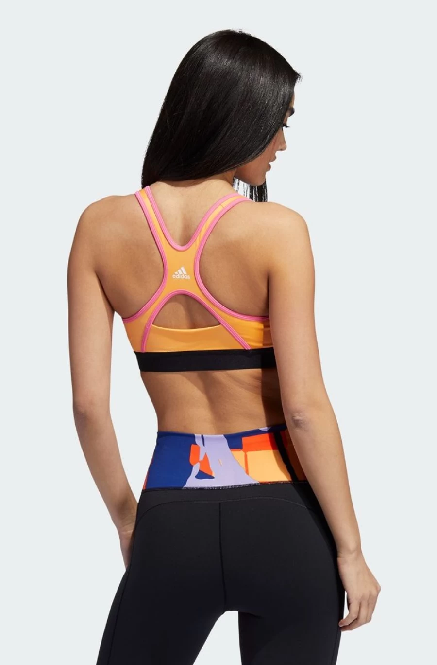 Adidas Women's Love Unites Believe This 2.0 Graphic Bra in Hazy Orange